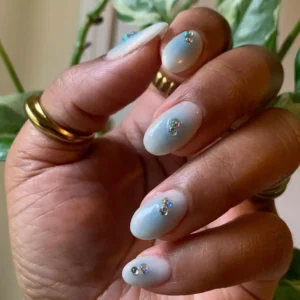 Milky White and Blue Aura Nails 